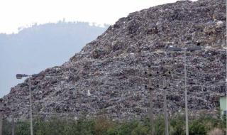 a towering mountain of waste in the outskirts of Addis Ababa